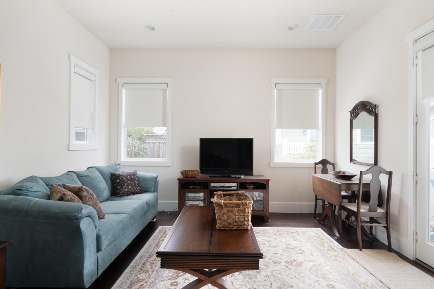 18527 McClellan Circle Marina, CA 93933 - Photo 21 of 35 a living room with furniture and a flat screen tv