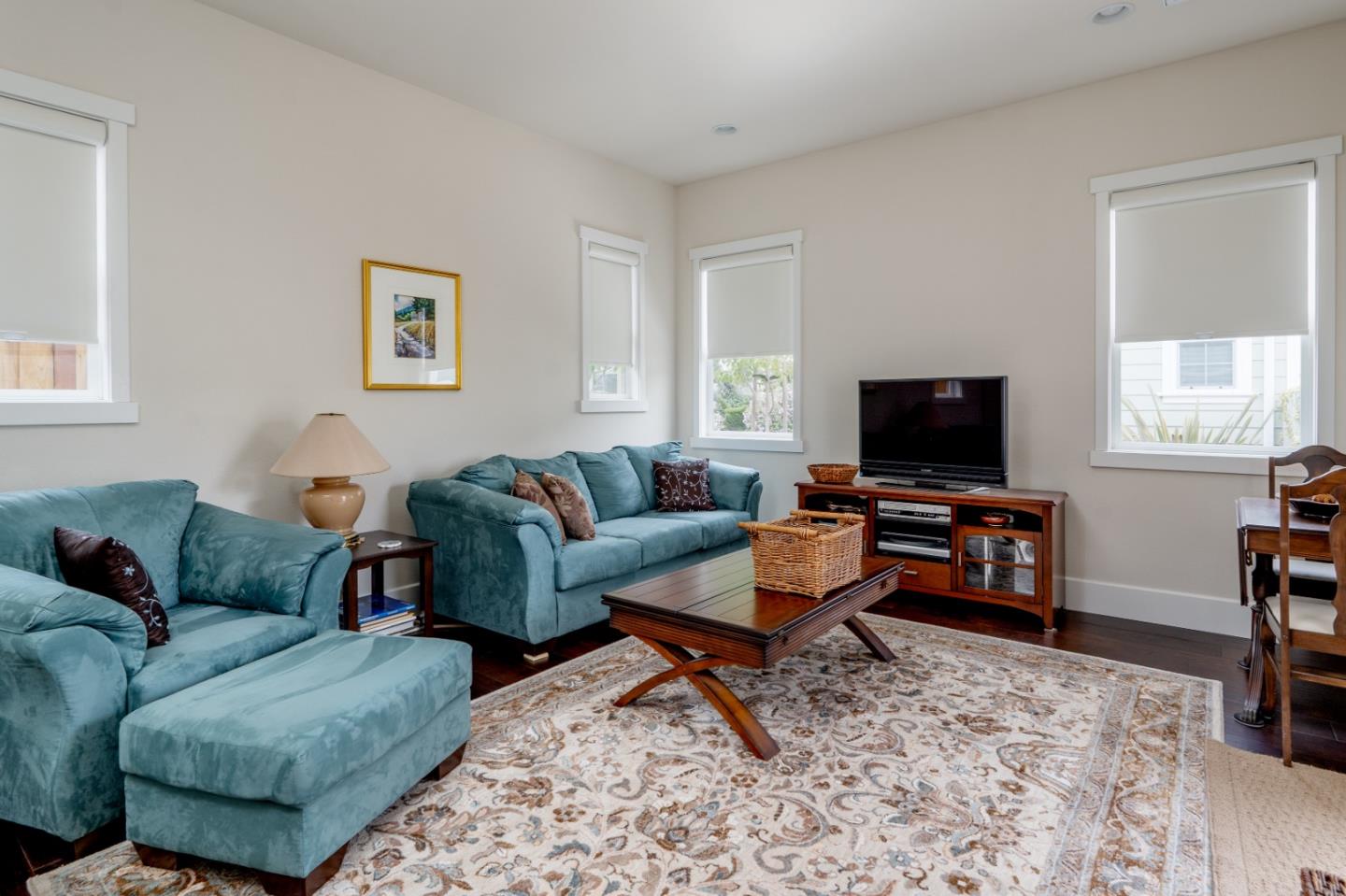 18527 McClellan Circle Marina, CA 93933 - Photo 22 of 35 a living room with furniture and a flat screen tv
