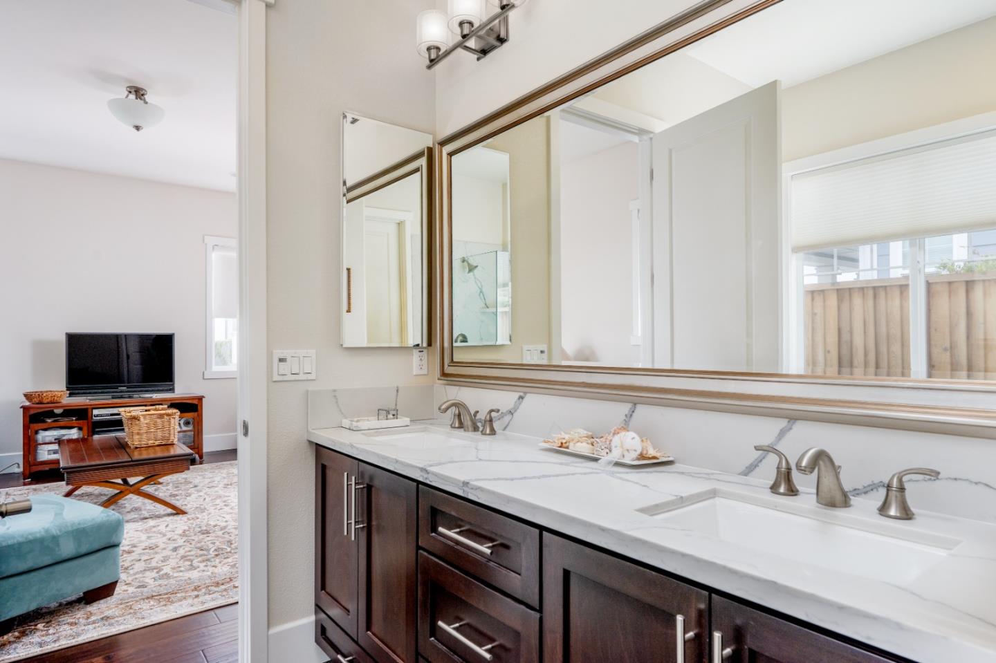 18527 McClellan Circle Marina, CA 93933 - Photo 23 of 35 a bathroom with a sink double vanity granite and a mirror