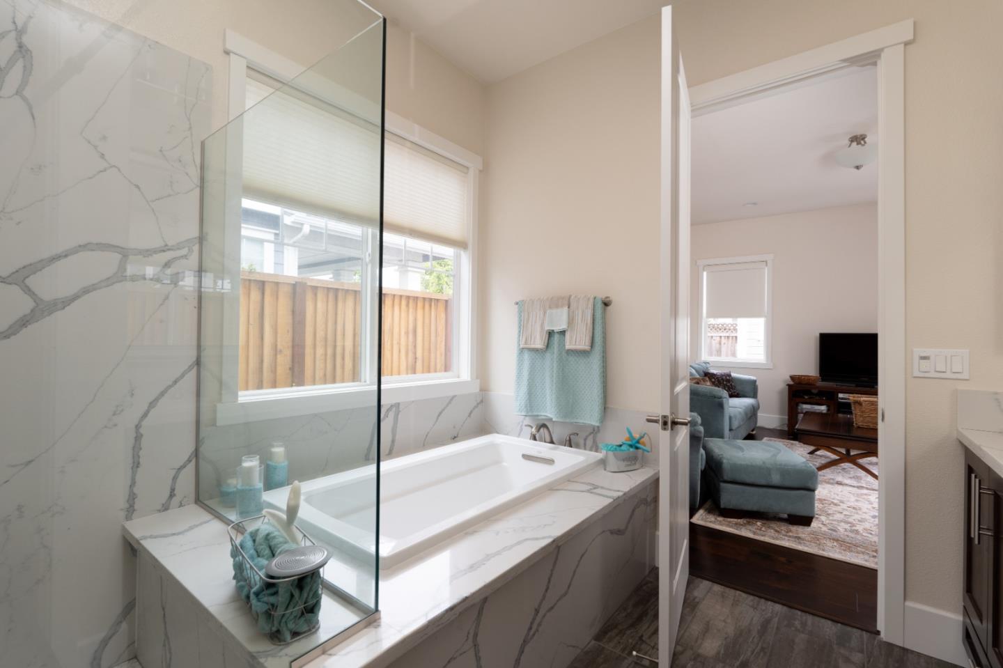 18527 McClellan Circle Marina, CA 93933 - Photo 24 of 35 a bedroom with a bed and large window