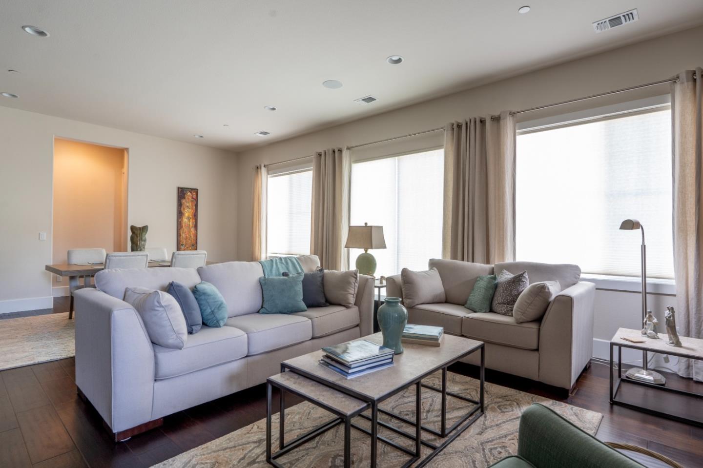 18527 McClellan Circle Marina, CA 93933 - Photo 9 of 35 a living room with furniture and a large window