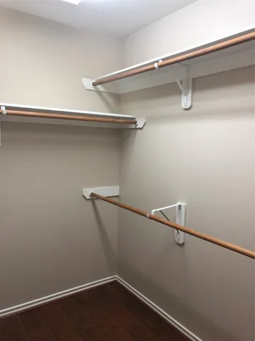 a view of a room with racks on the wall