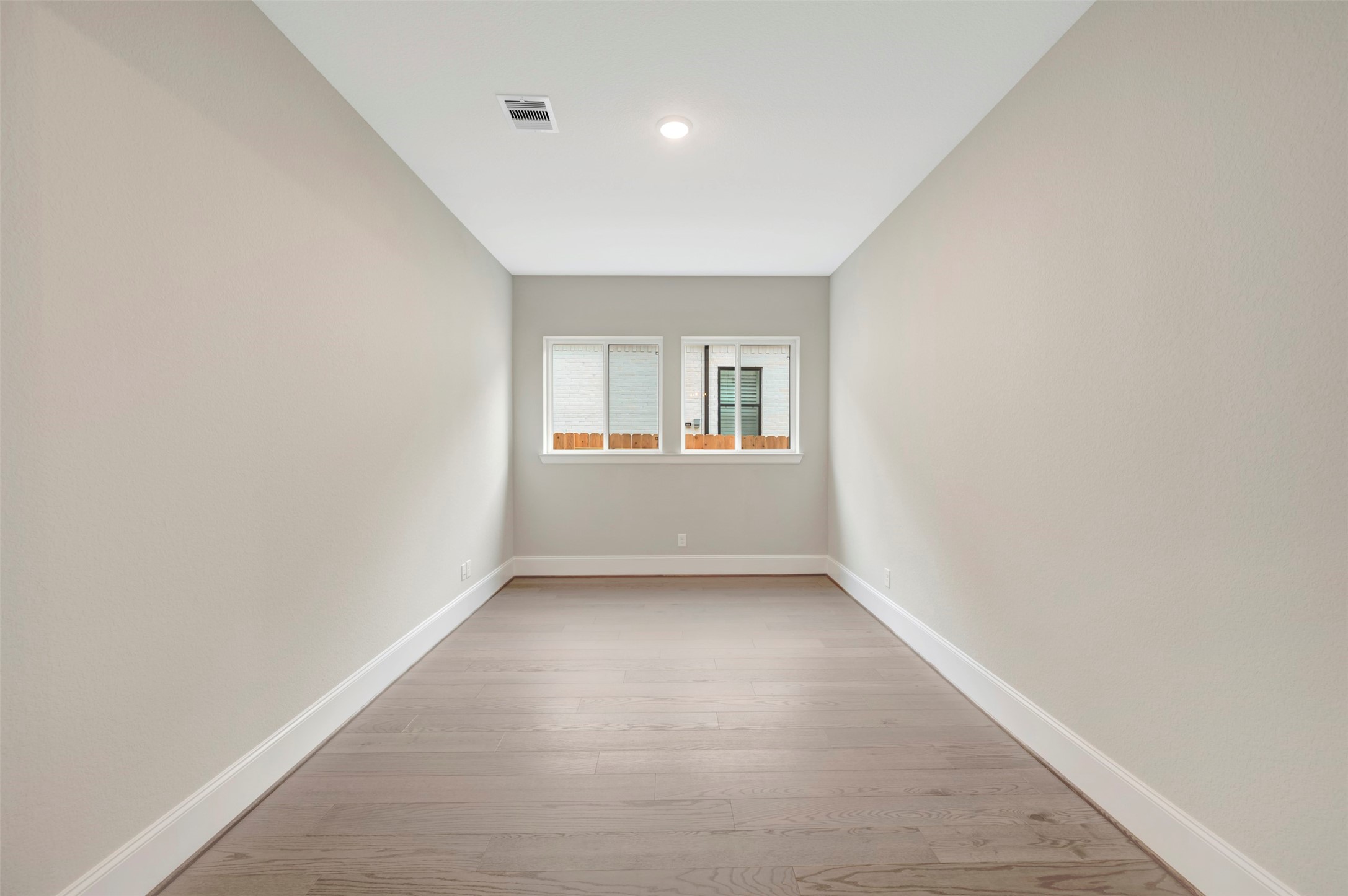 119 Rustica Bloom Trail Willis, TX 77318 - Photo 15 of 50 an empty room with windows
