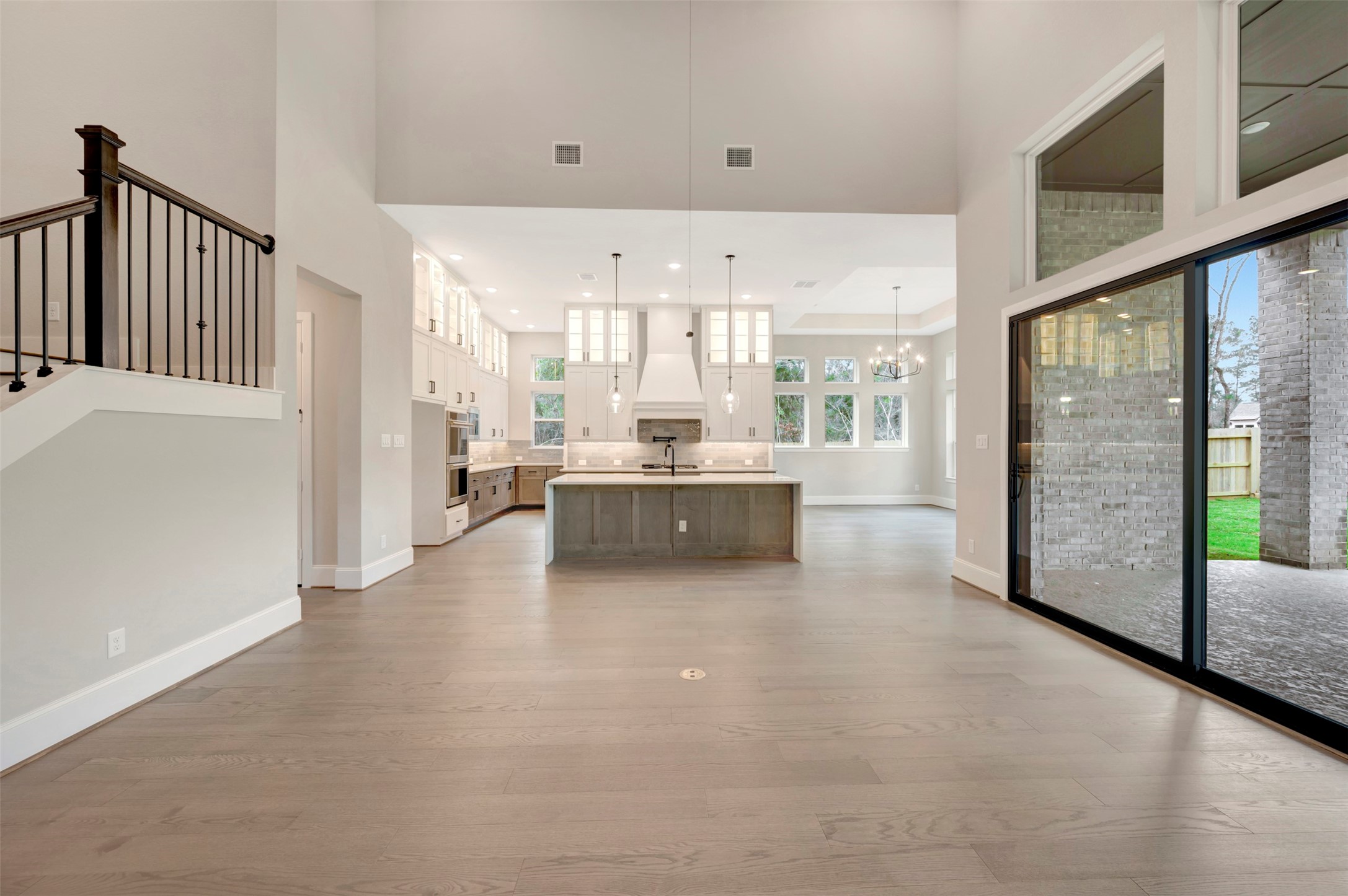 119 Rustica Bloom Trail Willis, TX 77318 - Photo 18 of 50 a large white kitchen with a large window