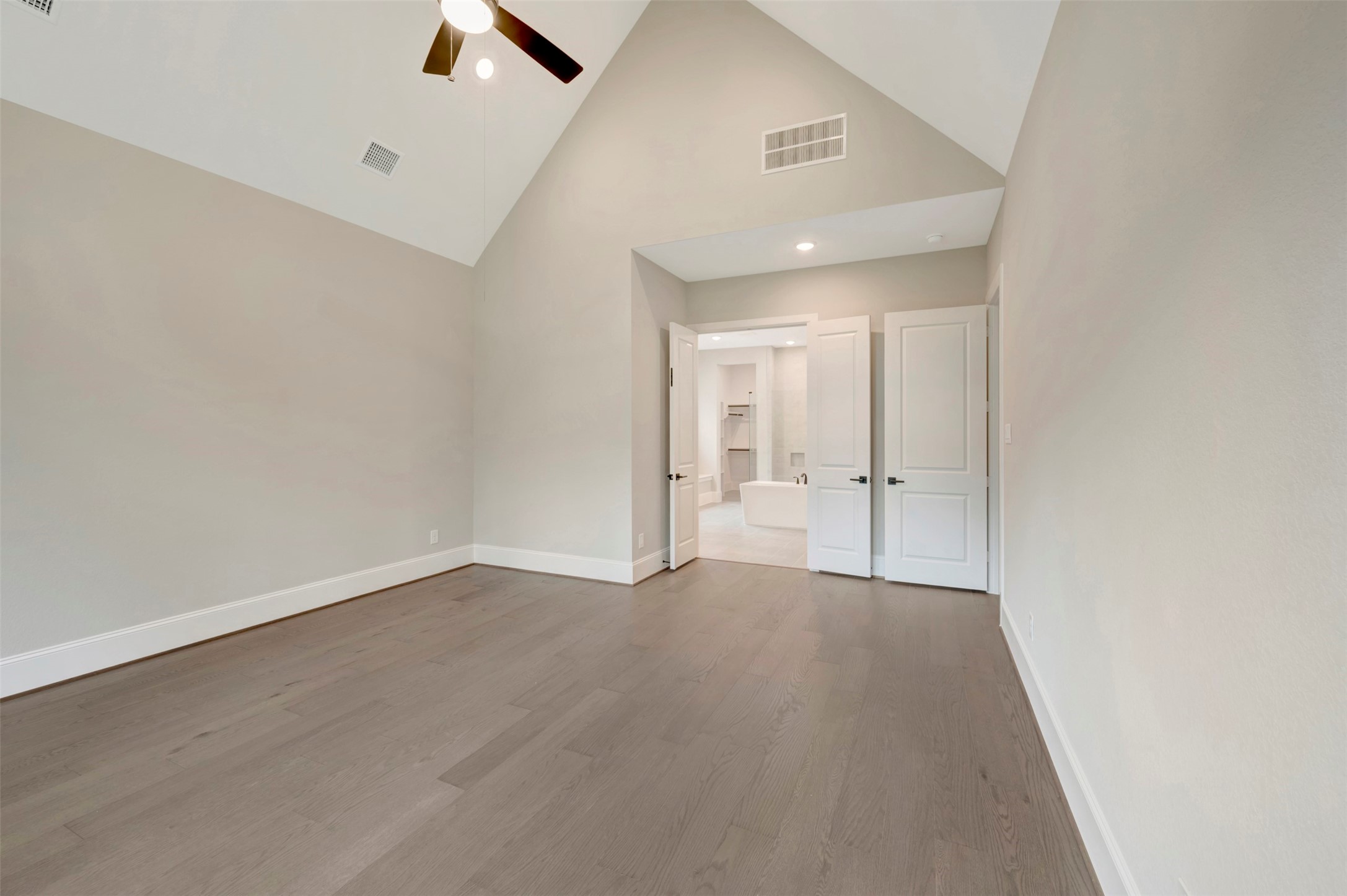 119 Rustica Bloom Trail Willis, TX 77318 - Photo 21 of 50 wooden floor in an empty room