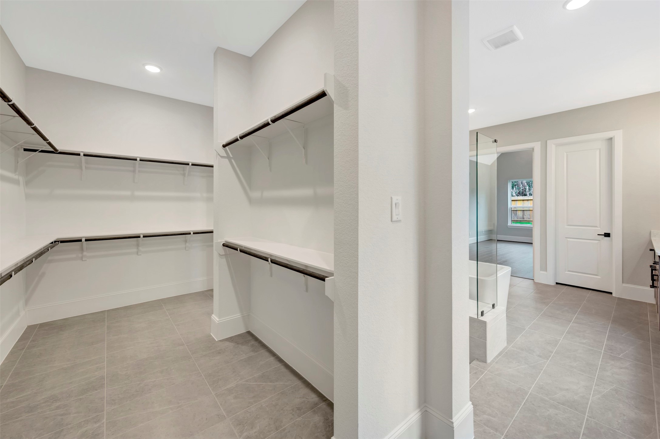 119 Rustica Bloom Trail Willis, TX 77318 - Photo 27 of 50 wooden floor in an empty room