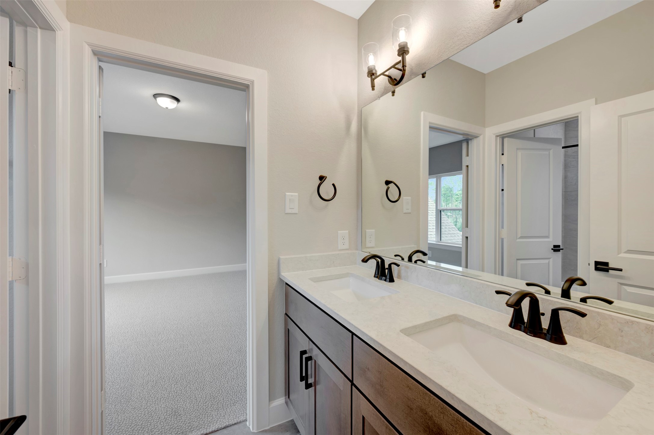119 Rustica Bloom Trail Willis, TX 77318 - Photo 44 of 50 a bathroom with a sink vanity and a mirror