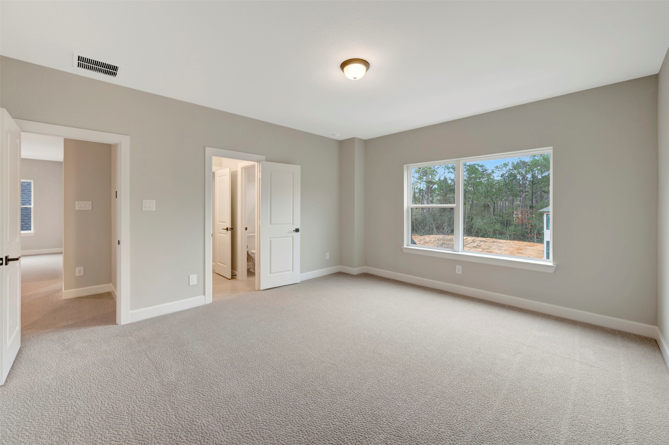119 Rustica Bloom Trail Willis, TX 77318 - Photo 45 of 50 a view of an empty room with a window
