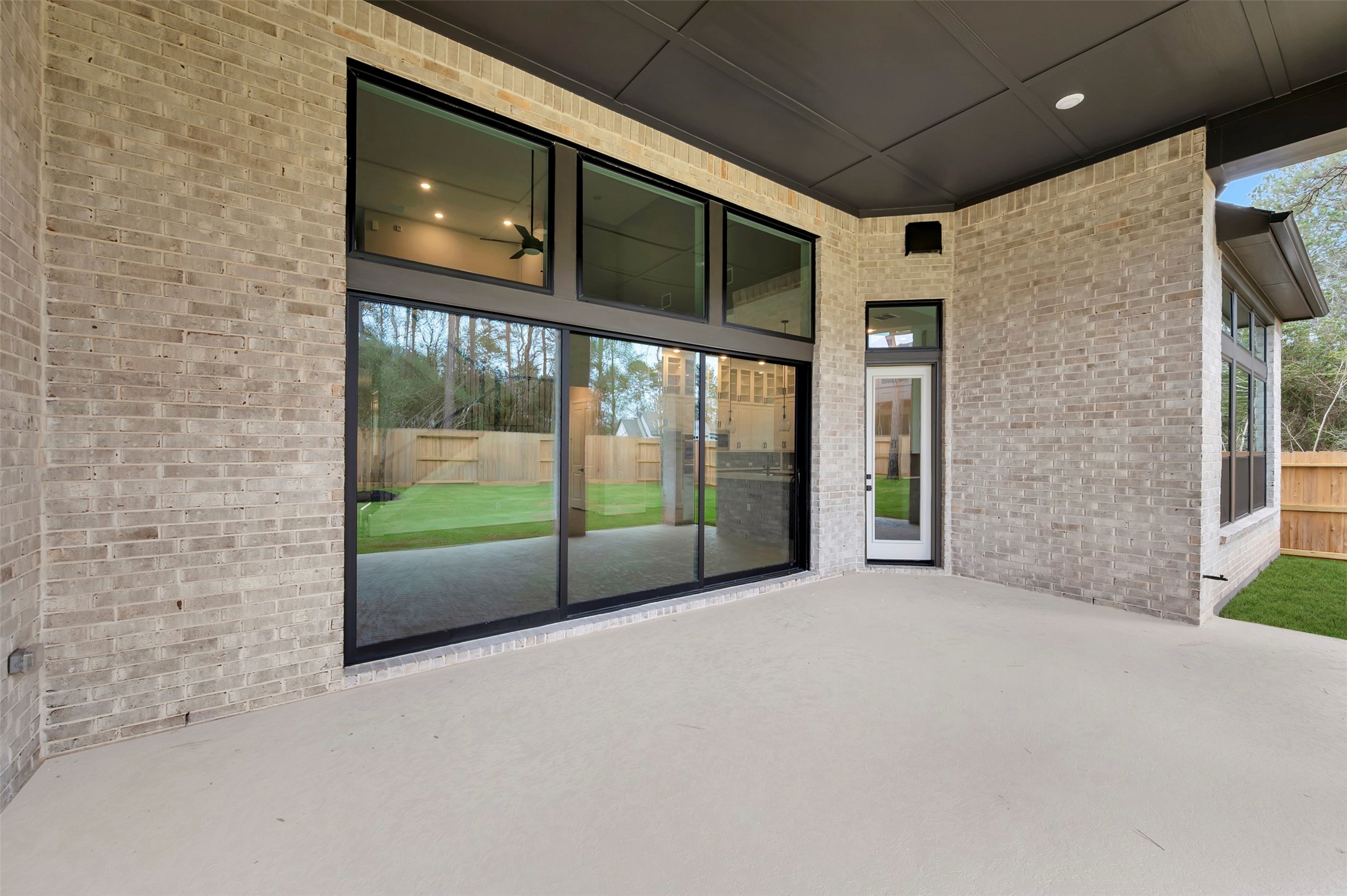 119 Rustica Bloom Trail Willis, TX 77318 - Photo 9 of 50 a view of an empty room with a balcony