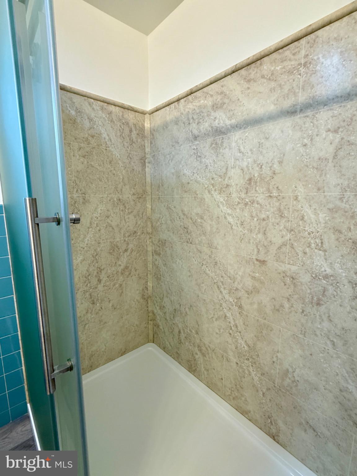 303 Oregon Avenue New Castle, DE 19720 - Photo 23 of 40 a bathroom with a shower