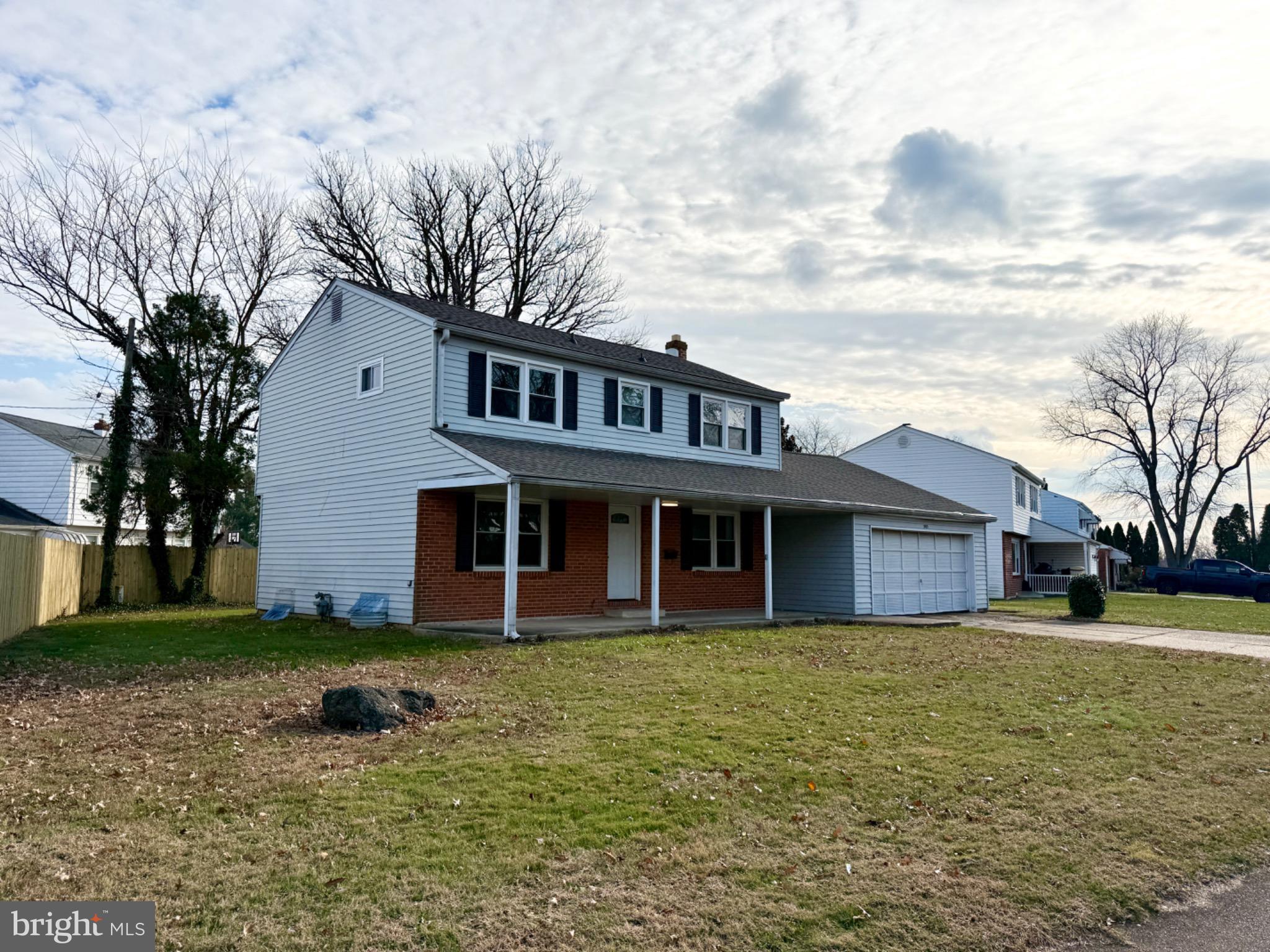 303 Oregon Avenue New Castle, DE 19720 - Photo 4 of 40 a front view of a house with a yard
