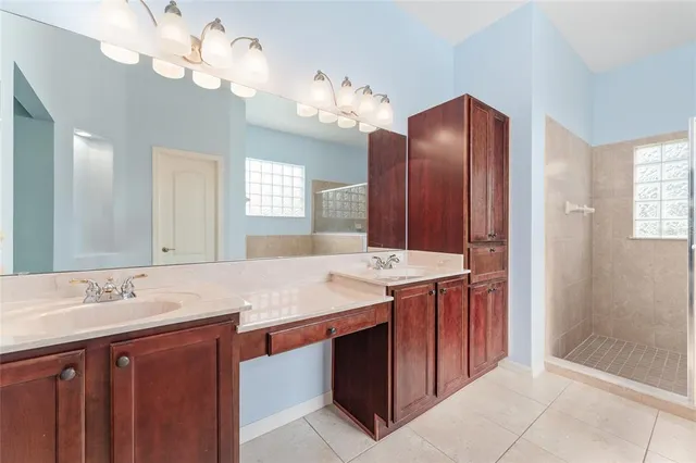 a bathroom with a sink a toilet and bathtub