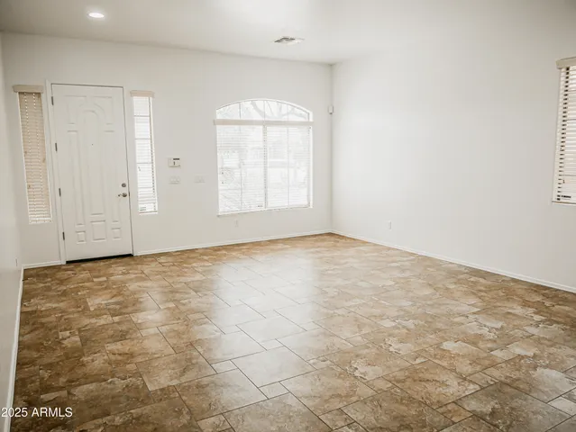 an empty room with a natural light