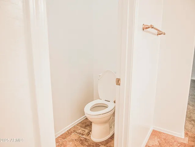 a bathroom with a toilet