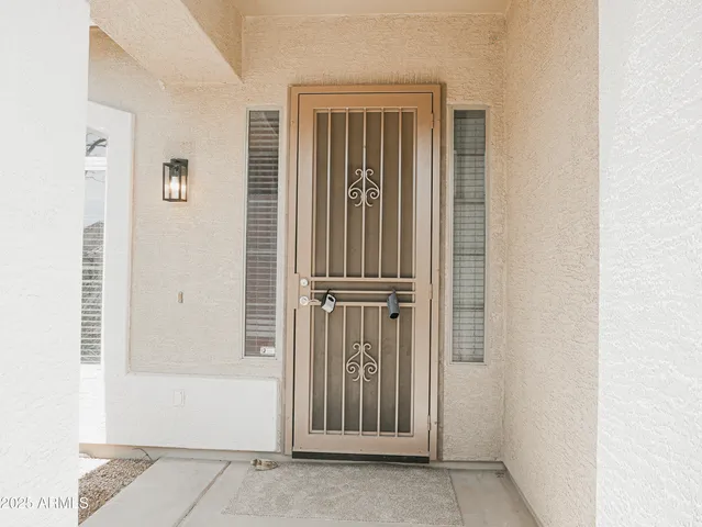a view of a house with a tree