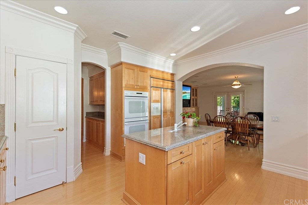 2432 Prospect Drive Upland, CA 91784 - Photo 14 of 46 a kitchen with refrigerator and cabinets