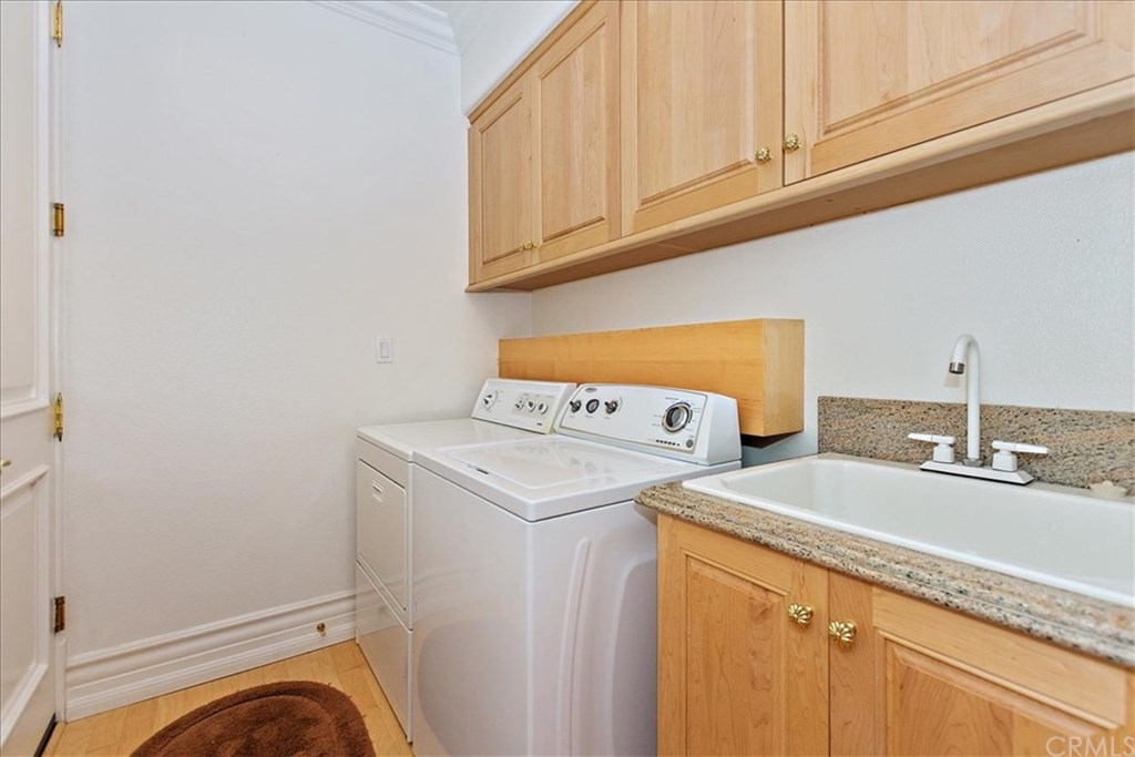 2432 Prospect Drive Upland, CA 91784 - Photo 15 of 46 a utility room with dryer and washer