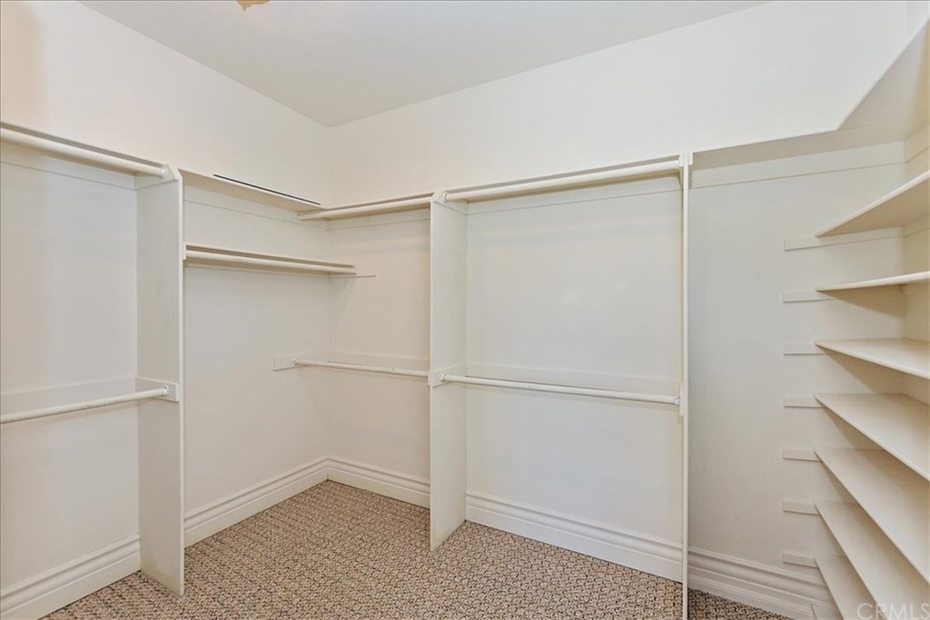 2432 Prospect Drive Upland, CA 91784 - Photo 20 of 46 a view of an empty walk in closet with empty racks
