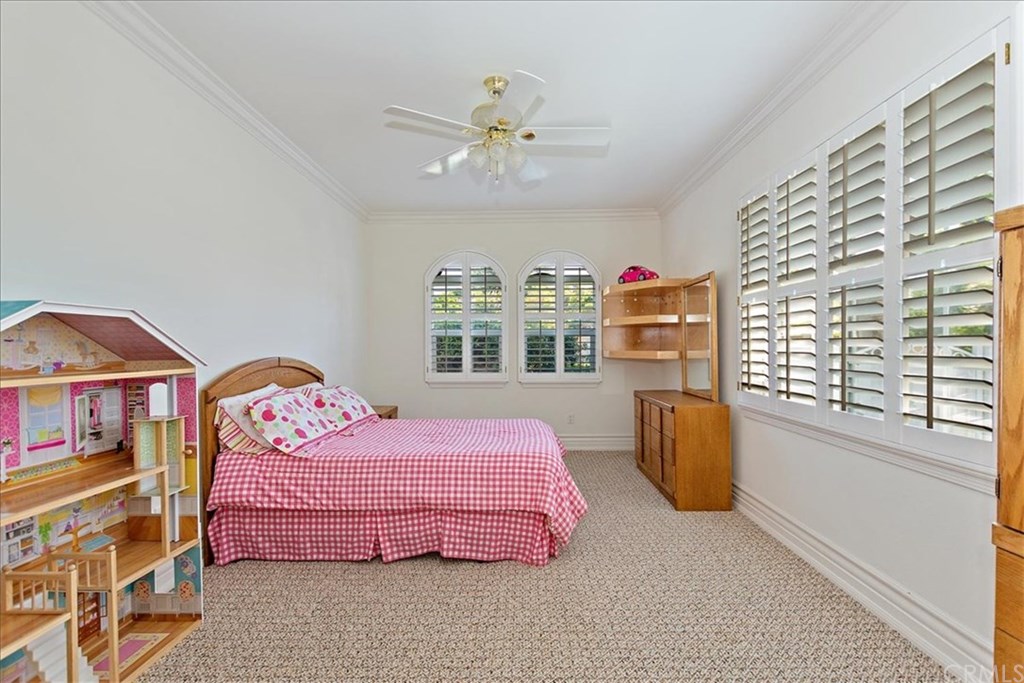 2432 Prospect Drive Upland, CA 91784 - Photo 23 of 46 a bedroom with a bed and a large window with the outer view