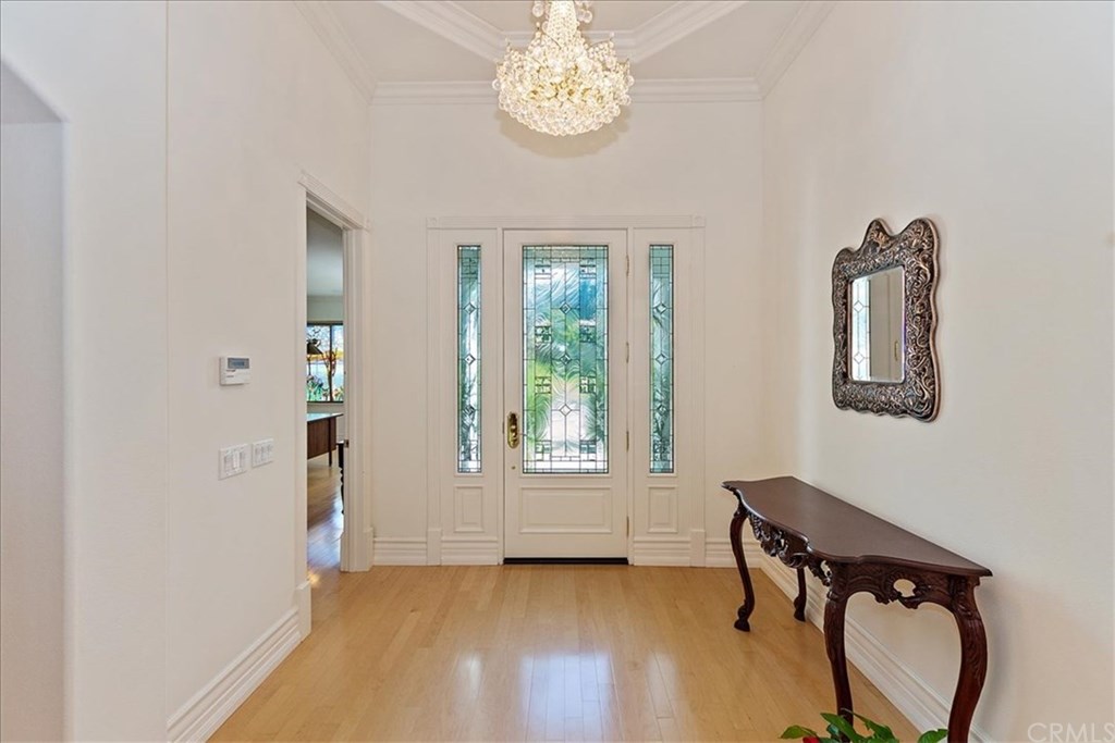 2432 Prospect Drive Upland, CA 91784 - Photo 3 of 46 a view of an empty room with a window and wooden floor