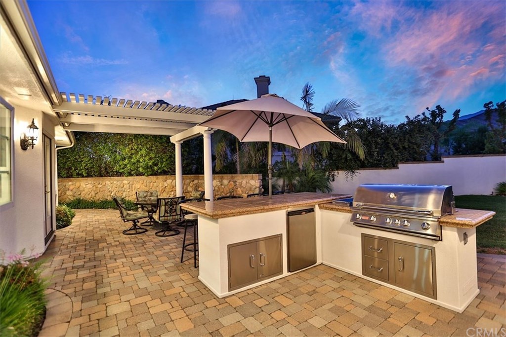 2432 Prospect Drive Upland, CA 91784 - Photo 41 of 46 a view of a patio with chairs and umbrellas