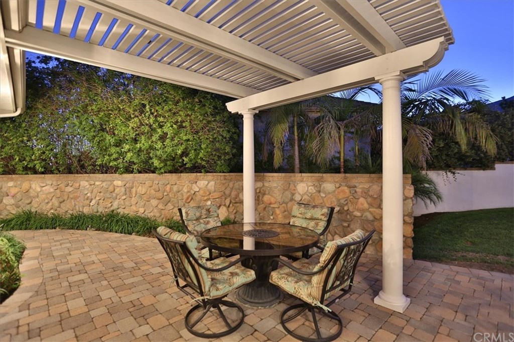 2432 Prospect Drive Upland, CA 91784 - Photo 44 of 46 a view of patio with table and chairs and potted plants