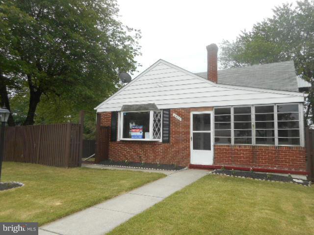 6313 Fieldvale Road Baltimore, MD 21237 - Photo 1 of 30 a front view of a house with garden