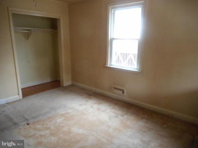 6313 Fieldvale Road Baltimore, MD 21237 - Photo 13 of 30 an empty room with a window