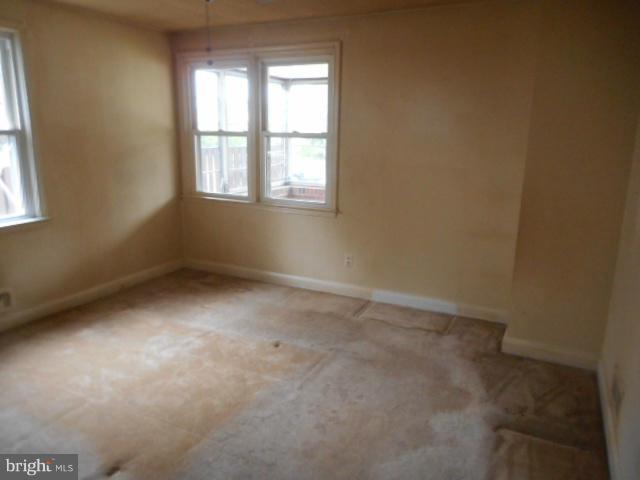 6313 Fieldvale Road Baltimore, MD 21237 - Photo 15 of 30 an empty room with a window