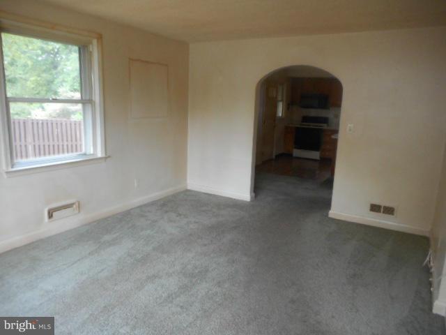 6313 Fieldvale Road Baltimore, MD 21237 - Photo 3 of 30 a view of an empty room with a window