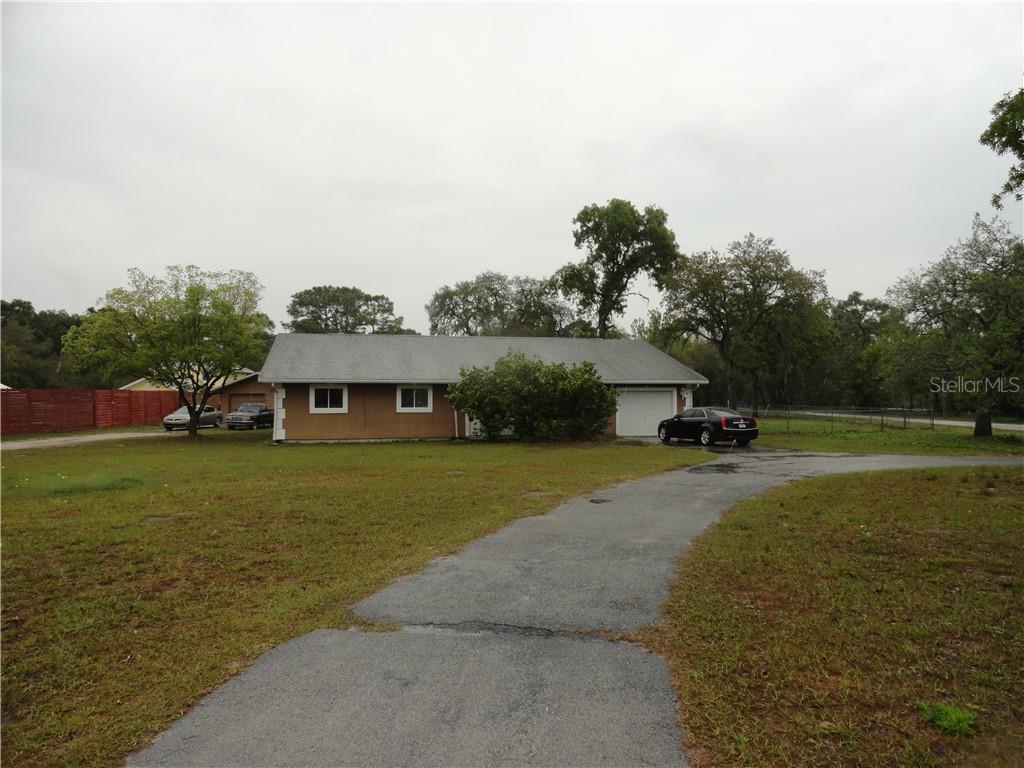 12433 Beagle Road Hudson, FL 34667 - Photo 1 of 1 Front