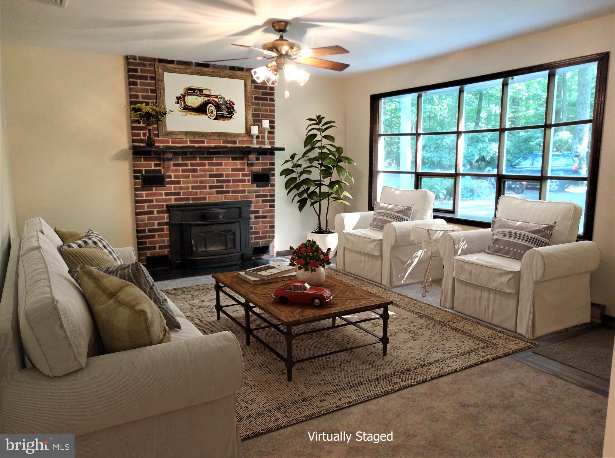 1454 Mission Road Quakertown, PA 18951 - Photo 11 of 47 Large Family Room with Wood Burning Stove and View