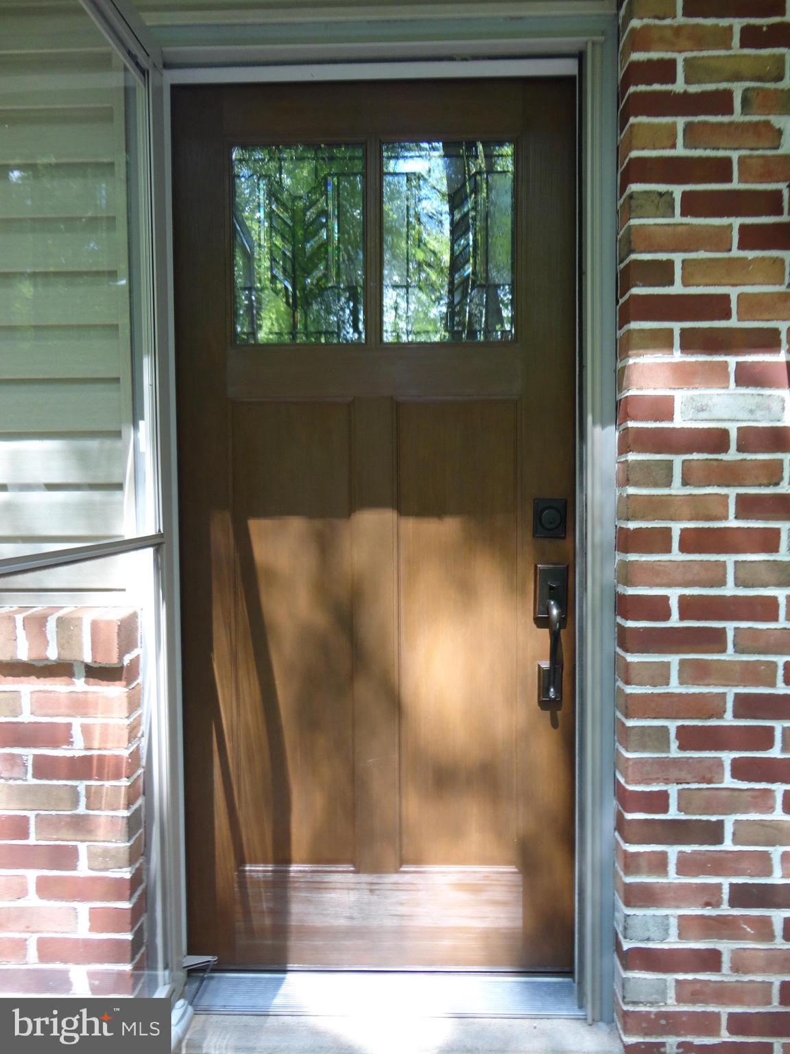 1454 Mission Road Quakertown, PA 18951 - Photo 9 of 47 Clear Storm Door Leading to Beautiful Solid Entry