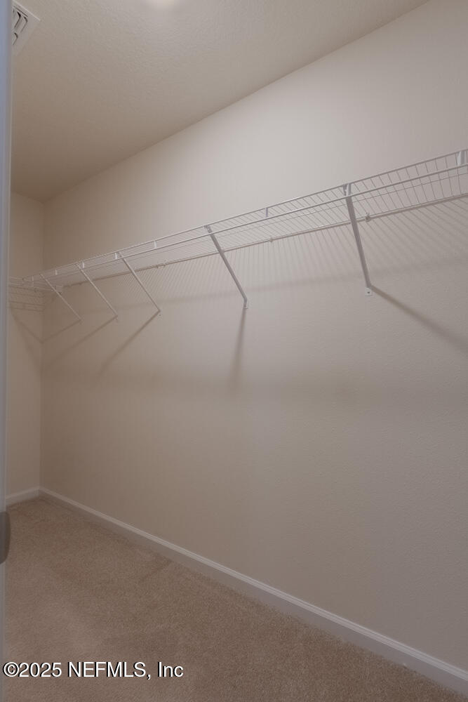 97 Coastline Way Street St. Augustine, FL 32092 - Photo 13 of 31 a view of a rack on the wall