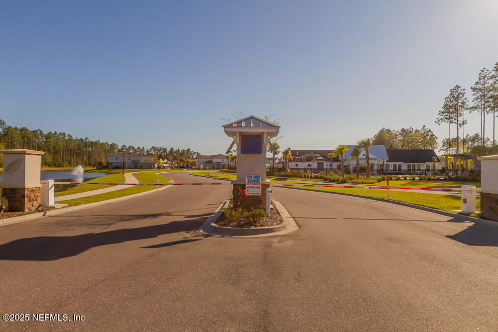 97 Coastline Way Street St. Augustine, FL 32092 - Photo 23 of 31 a view of a swimming pool and an outdoor space