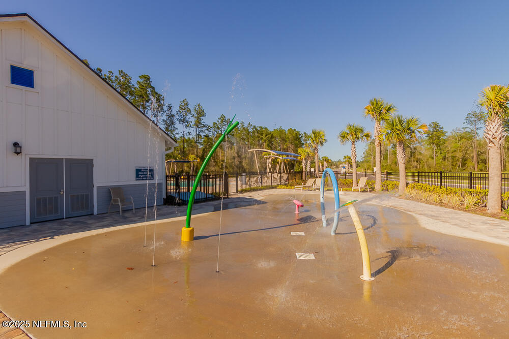 97 Coastline Way Street St. Augustine, FL 32092 - Photo 26 of 31 a view of a house with basketball court