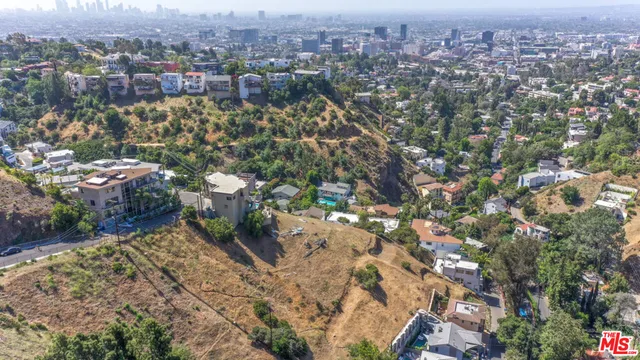 an aerial view of residential house with outdoor space