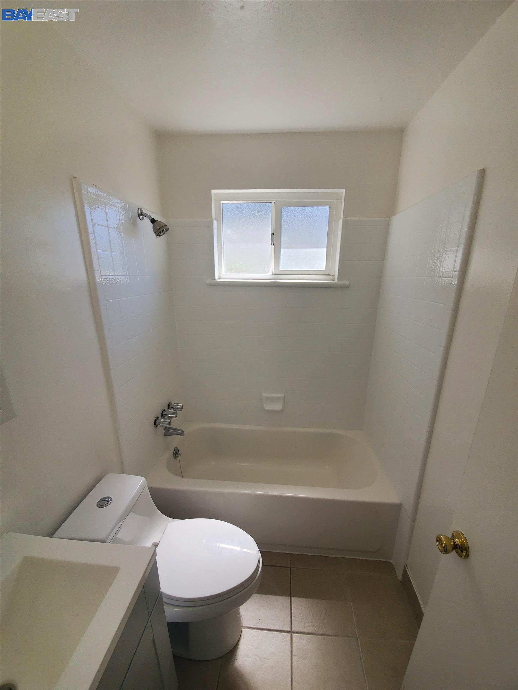 1869 E Street Hayward, CA 94541 - Photo 11 of 22 a bathroom with a sink and toilet