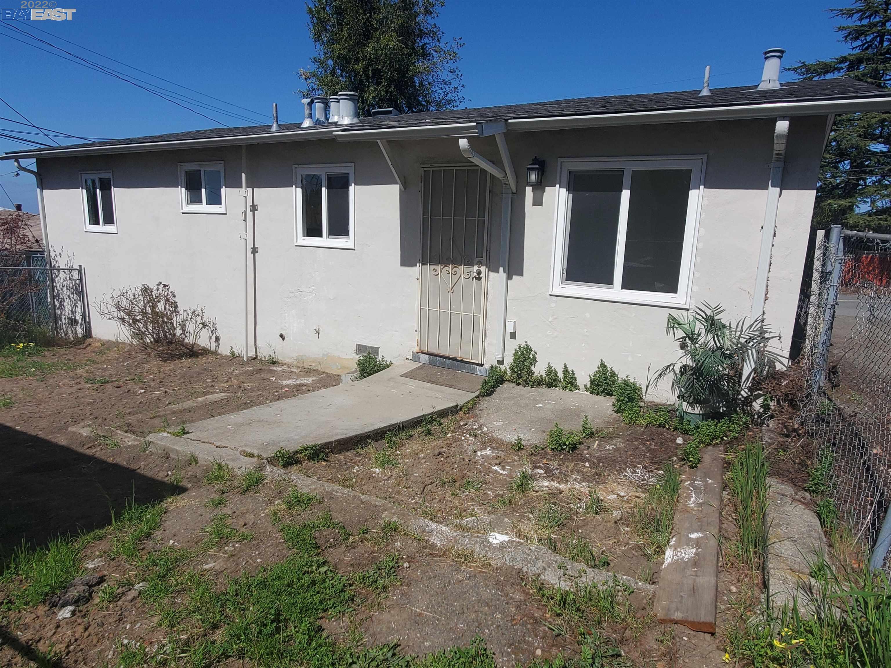 1869 E Street Hayward, CA 94541 - Photo 22 of 22 a front view of a house with garden