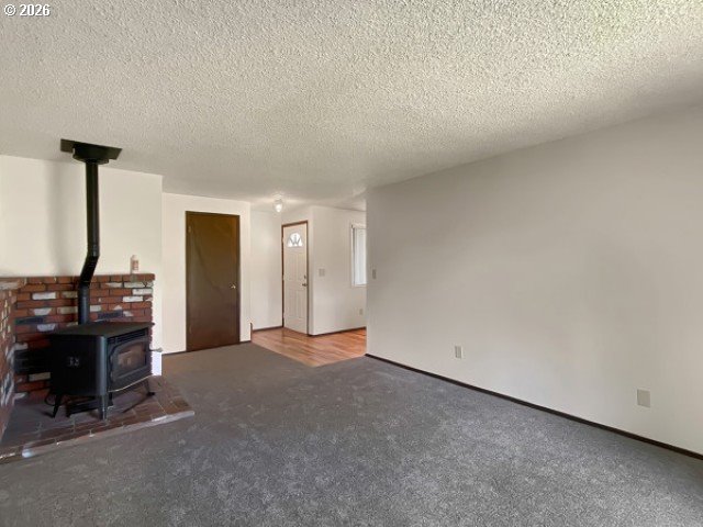710 Northeast 5th Street Willamina, OR 97396 - Photo 9 of 18 a view of a livingroom with furniture