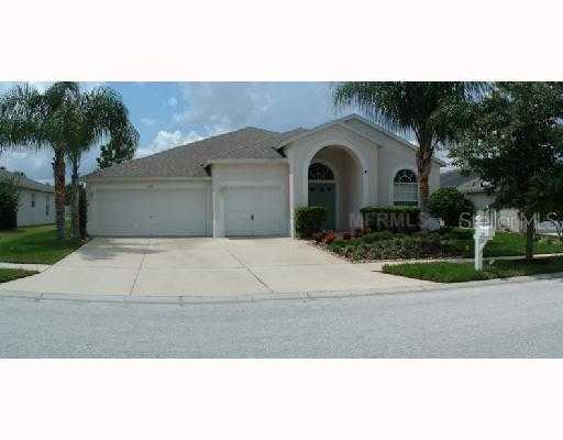 5231 Riva Drive Wesley Chapel, FL 33544 - Photo 1 of 1 Exterior Front - Lovely Curb Appeal with Prime Golf Course Frontage