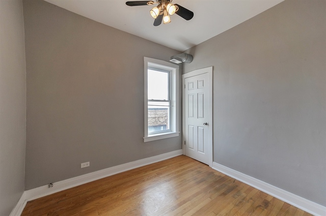 2012 West Haddon Avenue, Unit 3 Chicago, IL 60622 - Photo 11 of 12 a view of an empty room with a window
