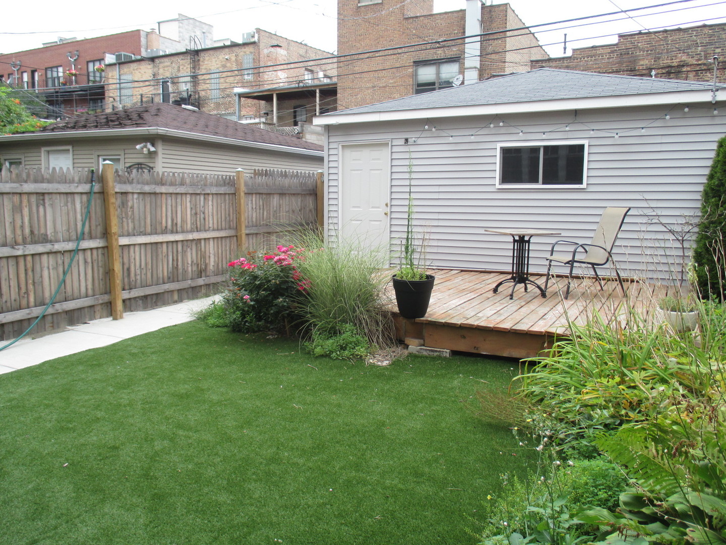 2012 West Haddon Avenue, Unit 3 Chicago, IL 60622 - Photo 12 of 12 a view of a house with a backyard and sitting area