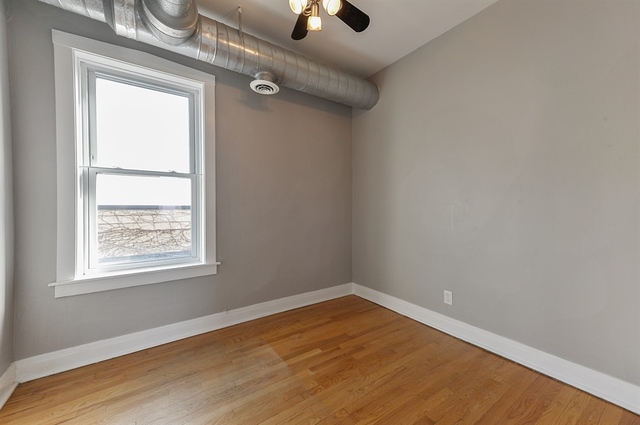2012 West Haddon Avenue, Unit 3 Chicago, IL 60622 - Photo 10 of 12 an empty room with a window
