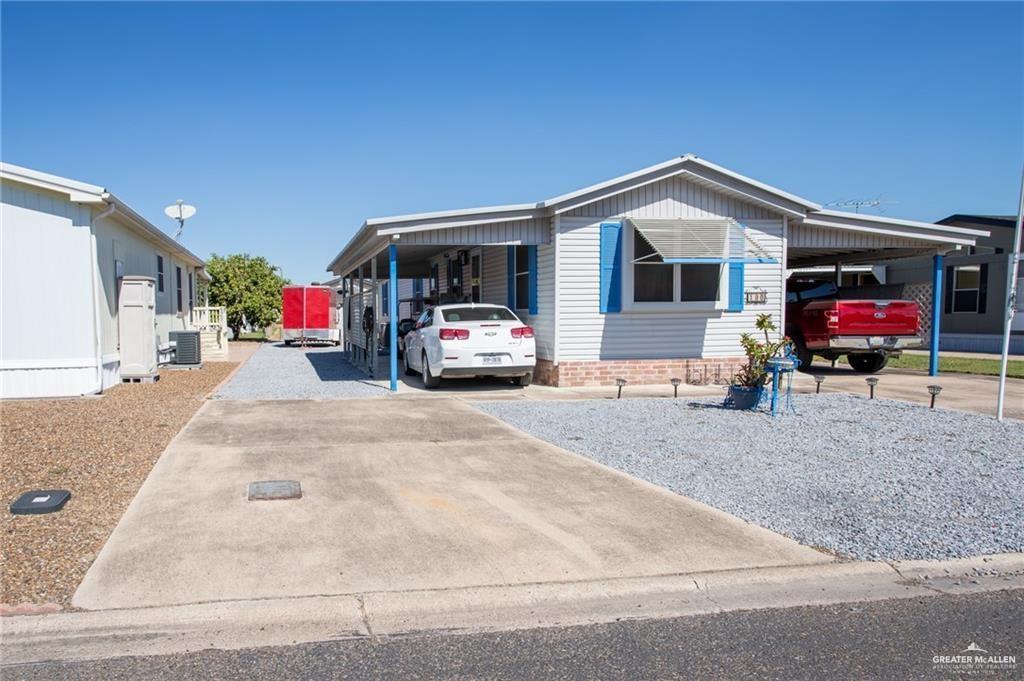 128 Nap Street Mission, TX 78572 - Photo 14 of 14 Manufactured home featuring white siding and a light blue trim