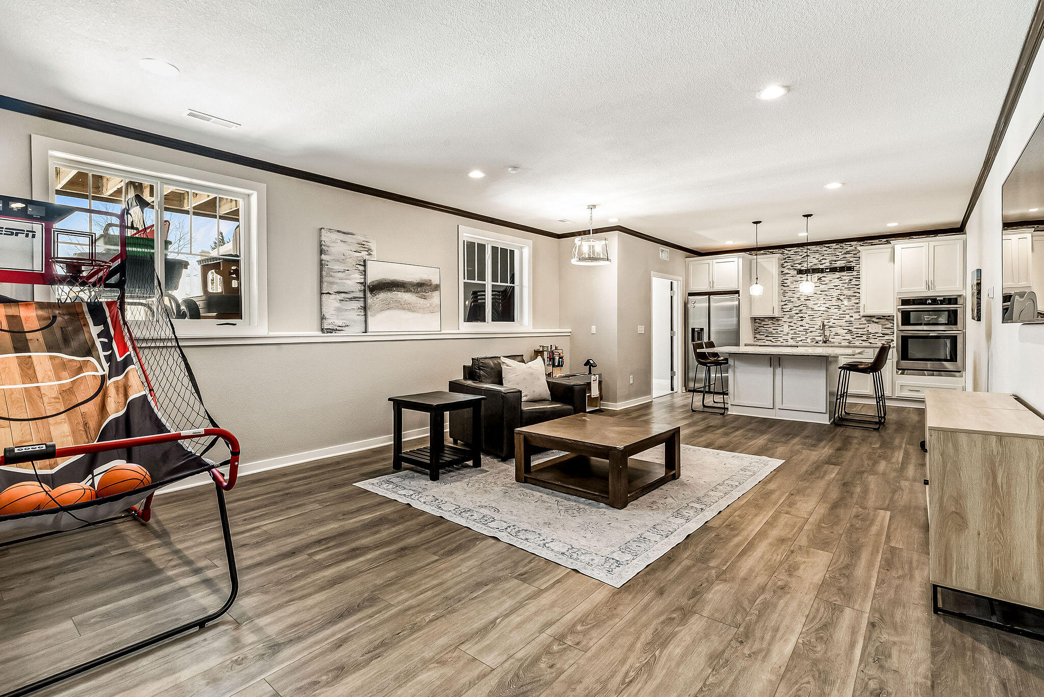 8955 Highlander Drive Mequon, WI 53097 - Photo 25 of 36 Lower Level - Living Room Area
