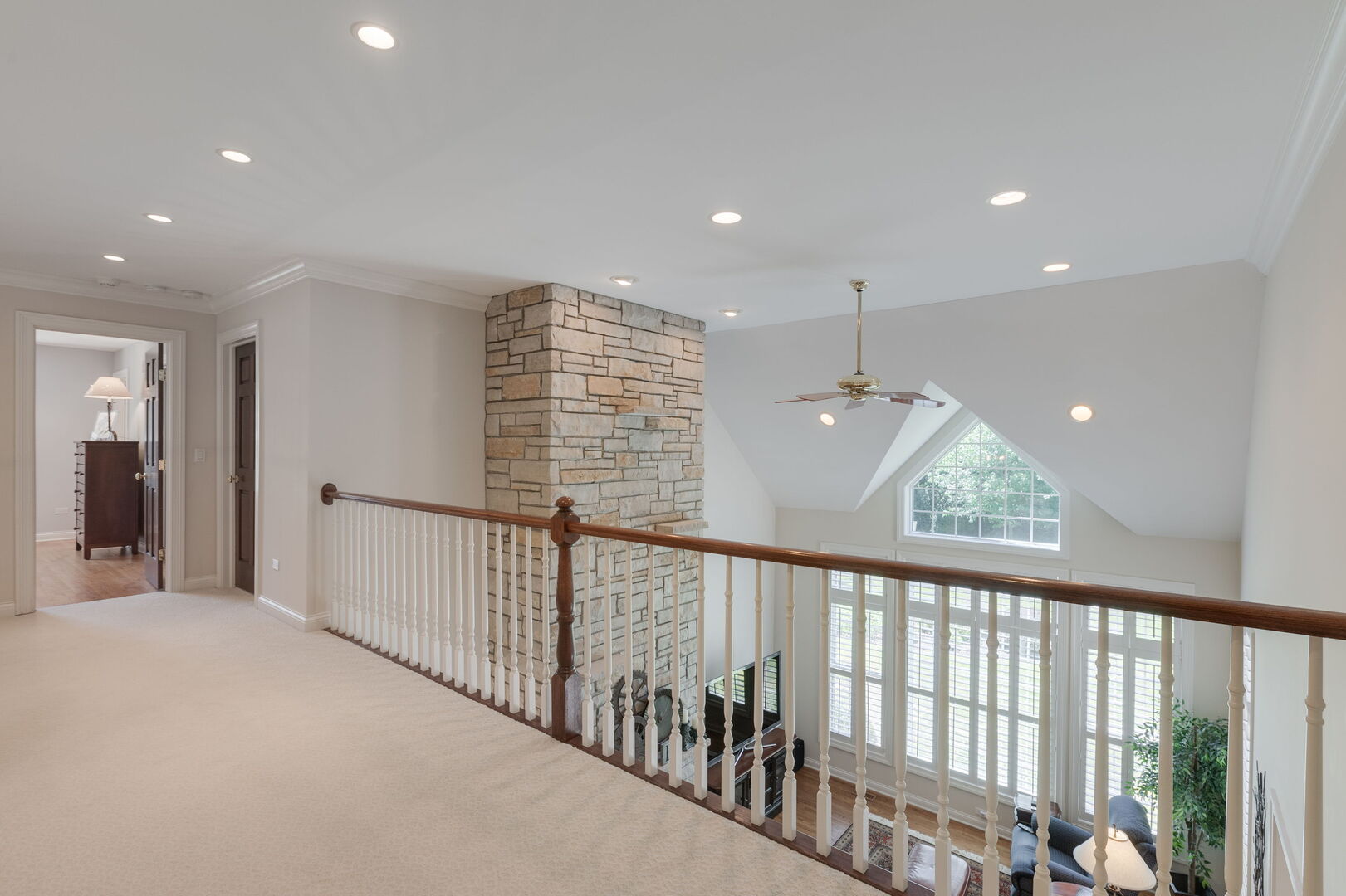 209 Carriage Trail Barrington, IL 60010 - Photo 21 of 42 a view of a hallway with windows