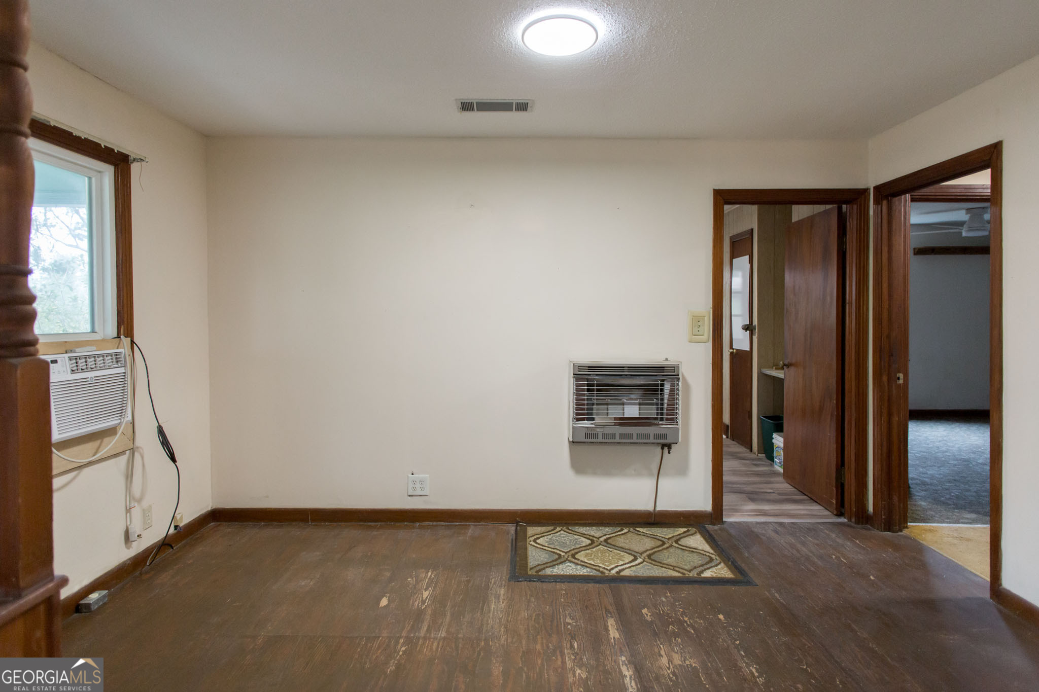 4618 Old Waltertown Road Waycross, GA 31503 - Photo 11 of 39 an empty room with windows