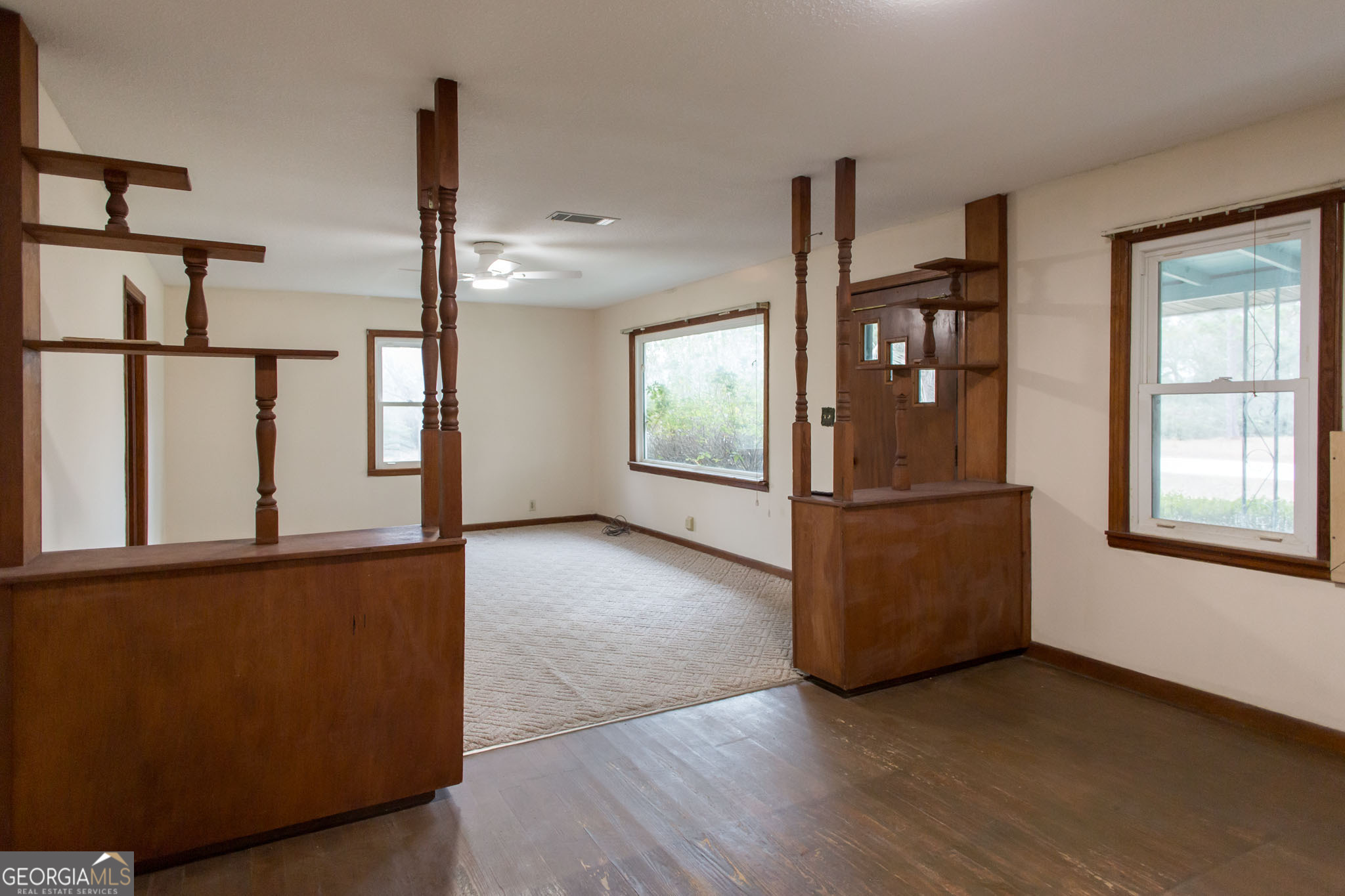 4618 Old Waltertown Road Waycross, GA 31503 - Photo 12 of 39 a view of hallway with furniture and windows