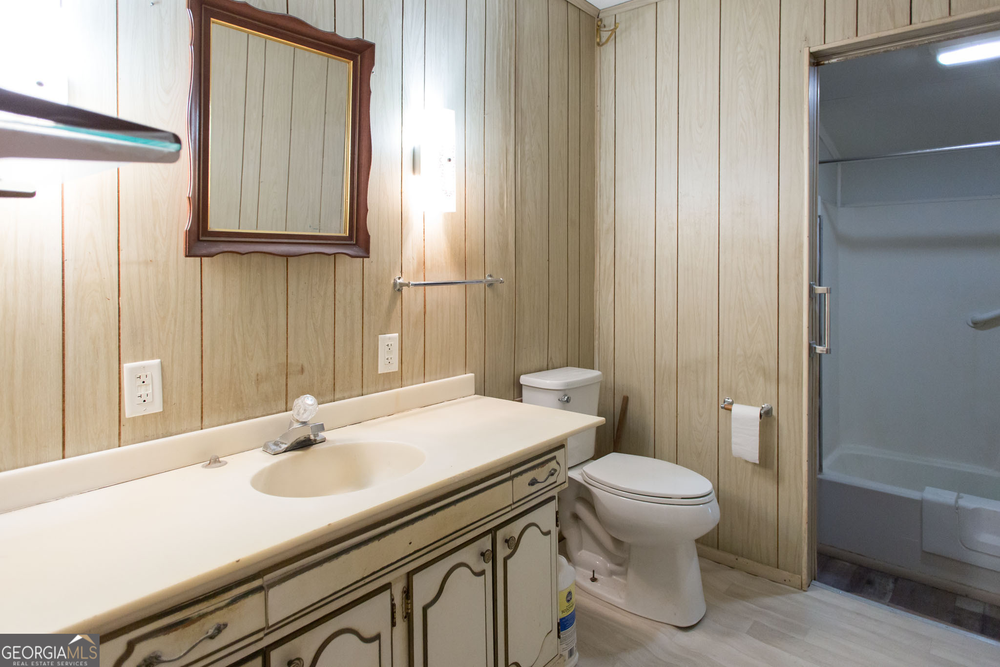 4618 Old Waltertown Road Waycross, GA 31503 - Photo 18 of 39 a bathroom with a sink a toilet and shower